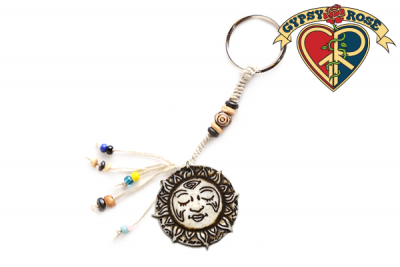 SLEEPING SUN CARVED BONE KEYCHAIN