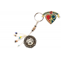 SLEEPING SUN CARVED BONE KEYCHAIN